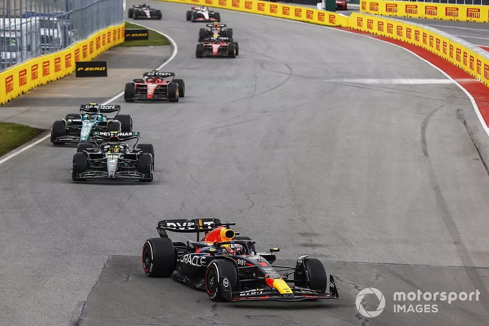 Max Verstappen, Red Bull Racing RB19, leads Sir Lewis Hamilton, Mercedes F1 W14, Fernando Alonso, Aston Martin AMR23, and Charles Leclerc, Ferrari SF-23
