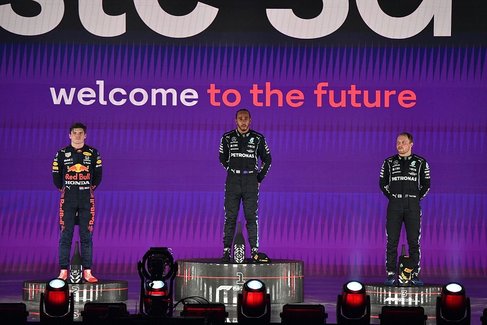 Max Verstappen, Red Bull Racing, 2nd position, Lewis Hamilton, Mercedes, 1st position, and Valtteri Bottas, Mercedes, 3rd position