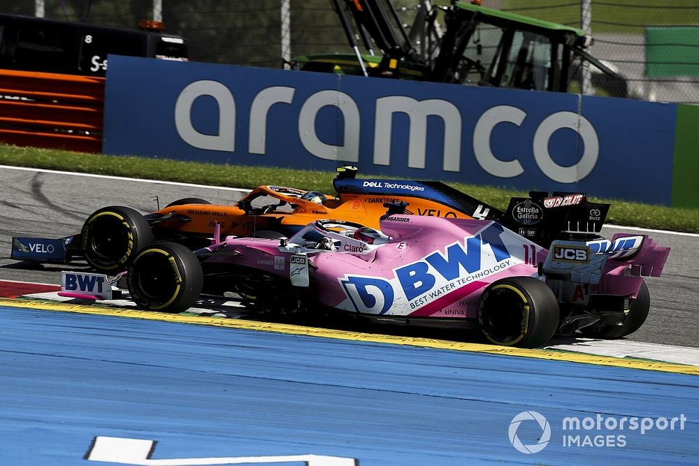 Lando Norris, McLaren MCL35, passes Sergio Perez, Racing Point RP20