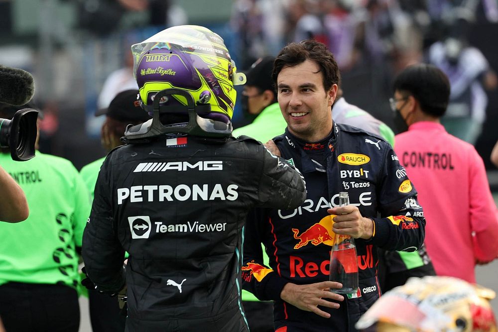 Lewis Hamilton, Mercedes AMG, 2nd position, Sergio Perez, Red Bull Racing, 3rd position, in Parc Ferme