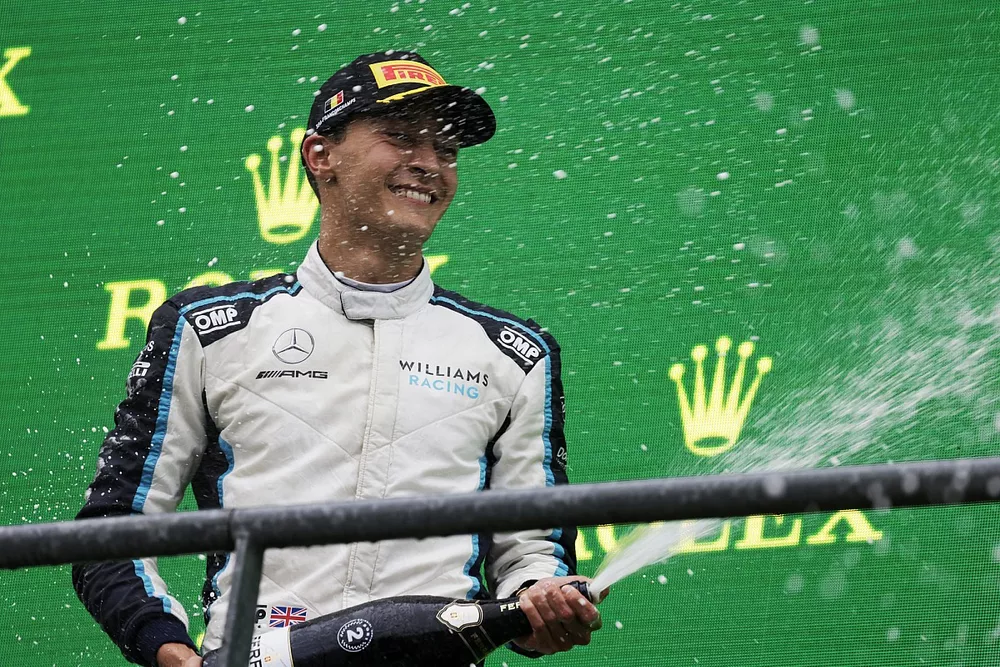 George Russell, Williams, 2nd position, sprays Champagne on the podium
