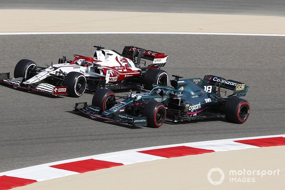 Lance Stroll, Aston Martin AMR21, Kimi Raikkonen, Alfa Romeo Racing C41