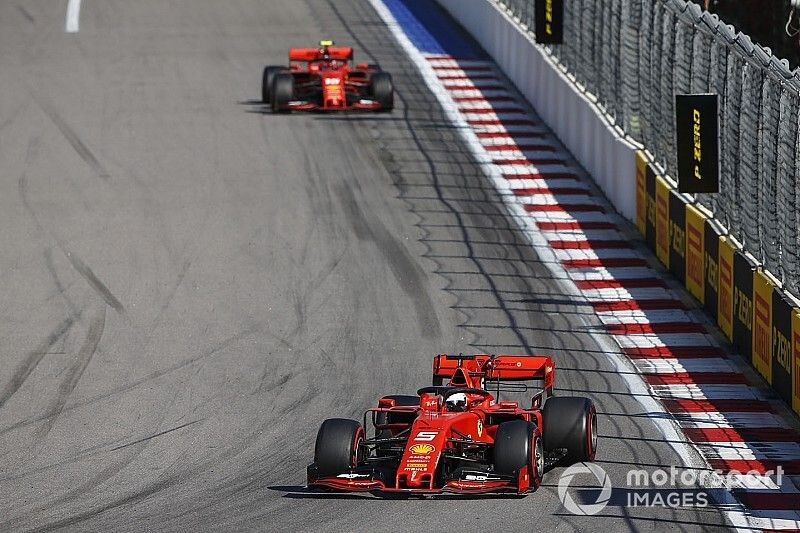 Sebastian Vettel, Ferrari SF90, leads Charles Leclerc, Ferrari SF90