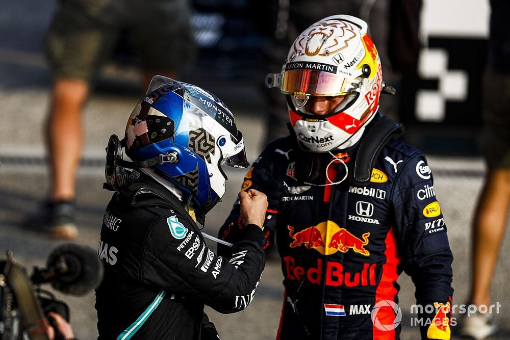 Pole Sitter Valtteri Bottas, Mercedes-AMG F1 and Max Verstappen, Red Bull Racing celebrate in Parc Ferme 