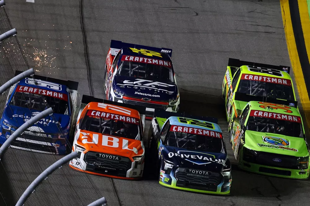 Chandler Smith wins in four-wide finish