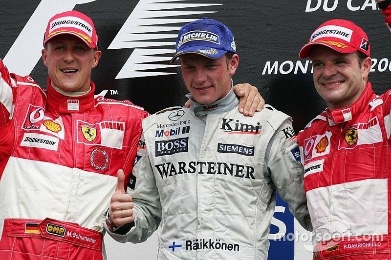 Podium: race winner Kimi Raikkonen with Michael Schumacher and Rubens Barrichello