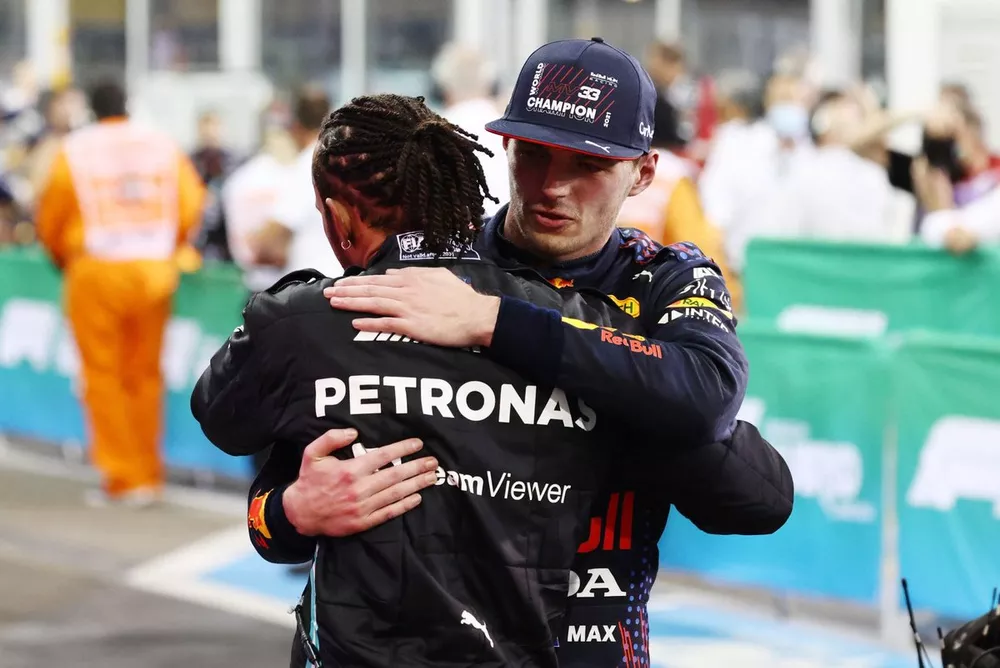 Lewis Hamilton, Mercedes, 2nd position, congratulates Max Verstappen, Red Bull Racing, 1st position, in Parc Ferme