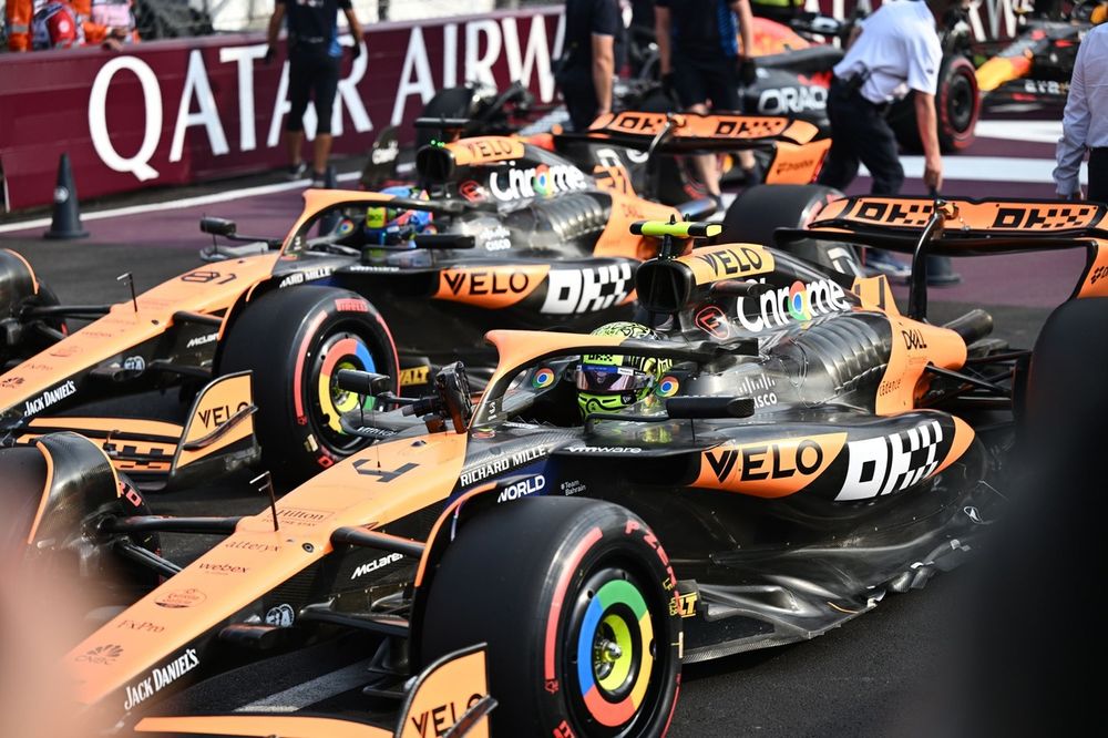 Pole man Lando Norris, McLaren MCL38, Oscar Piastri, McLaren MCL38, arrive in Parc Ferme after Qualifying