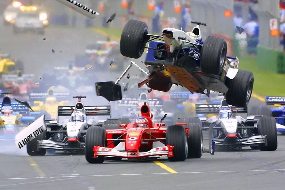 f1-australian-gp-2002-first-corner-accident-ralf-schumacher-williams-flying-over-rubens-ba