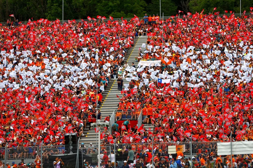 Fans form the Austrian flag colours in a grandstand