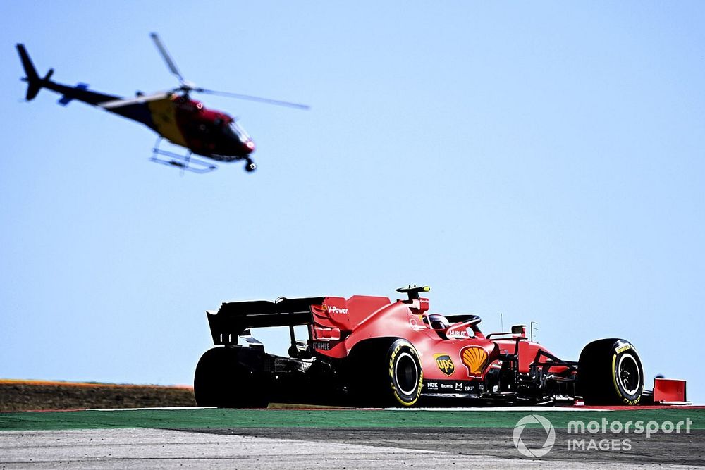Charles Leclerc, Ferrari SF1000, passes the Airbus H125 camera helicopter