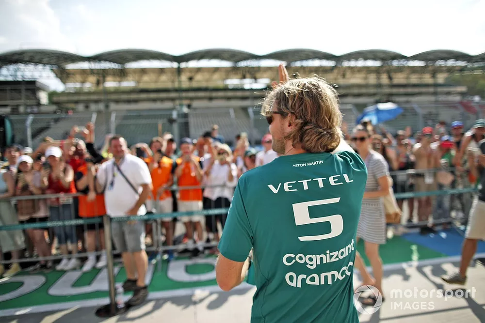 Sebastian Vettel, Aston Martin, waves to fans