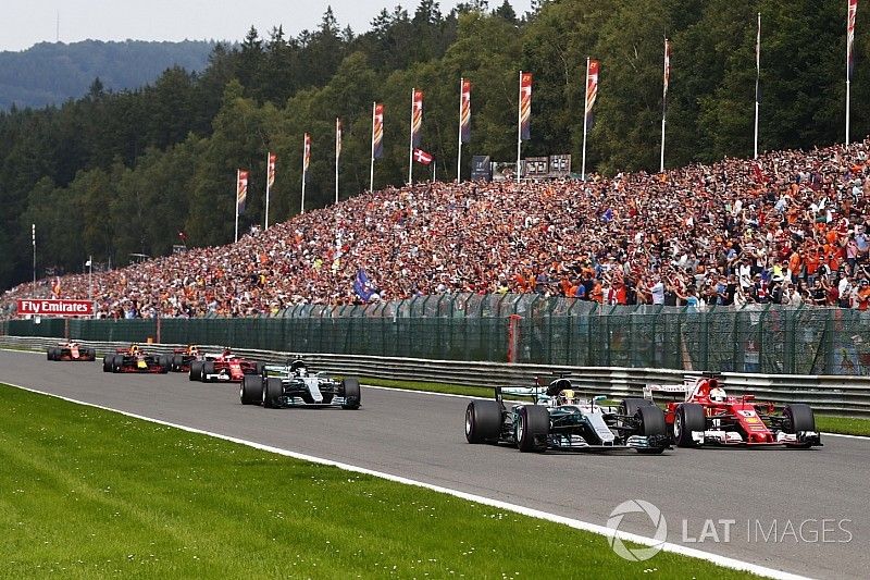 Lewis Hamilton, Mercedes AMG F1 W08, battles Sebastian Vettel, Ferrari SF70H, ahead of Valtteri Bott