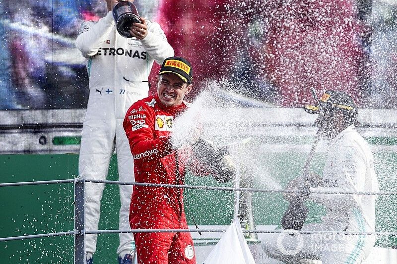 Race winner Charles Leclerc, Ferrari celebrates on the podium with the champagne 