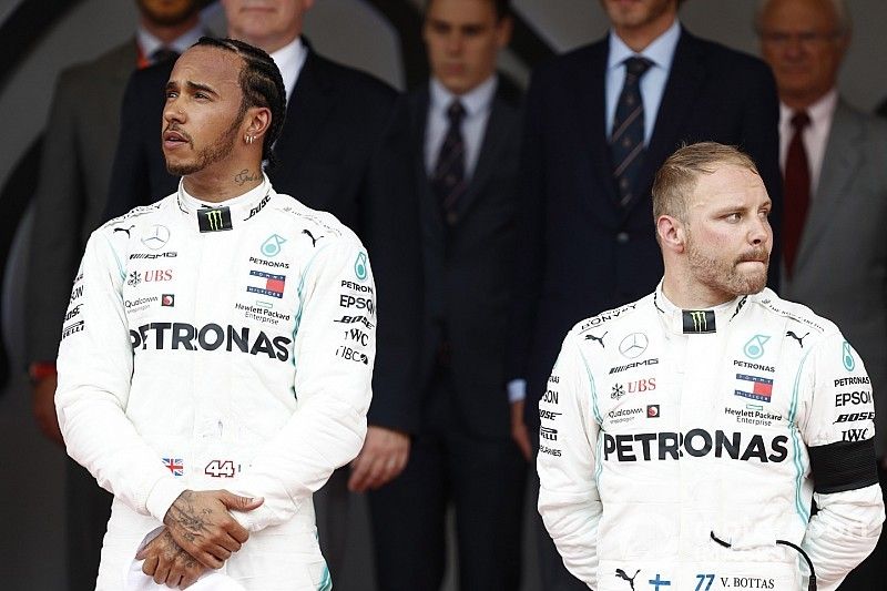 Lewis Hamilton, Mercedes AMG F1, 1st position, and Valtteri Bottas, Mercedes AMG F1, 3rd position, on the podium