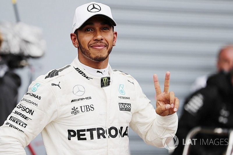Lewis Hamilton, Mercedes AMG F1, celebrates after taking his 69th F1 Pole Position