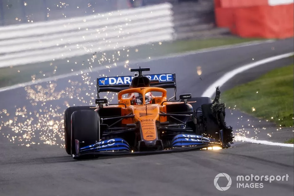 Carlos Sainz Jr., McLaren MCL35, heads into the pits with a front puncture