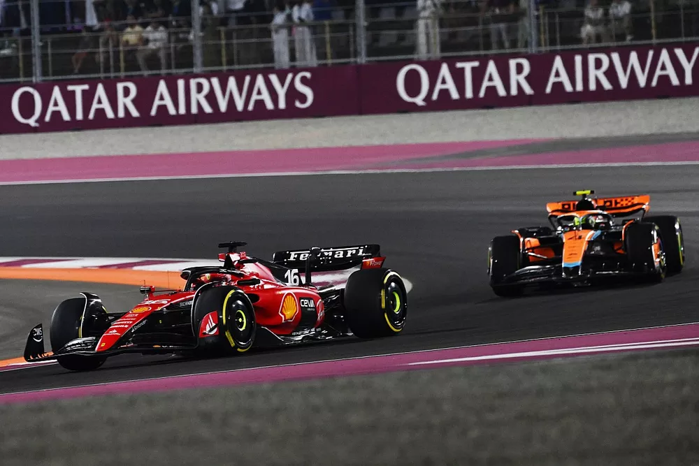Charles Leclerc, Ferrari SF-23, leads Lando Norris, McLaren MCL60
