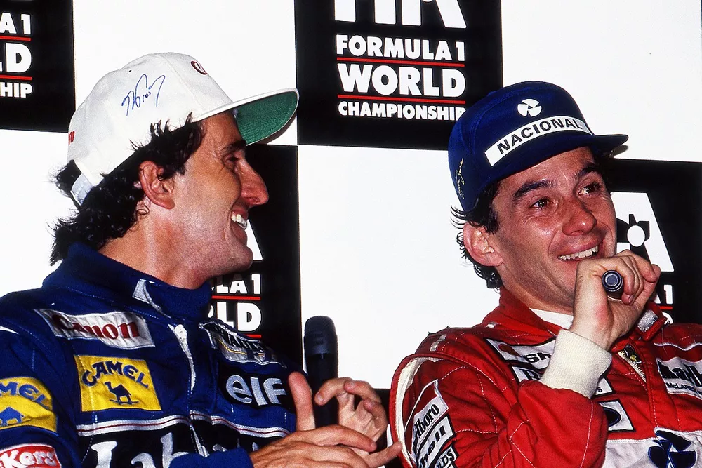 World Champion Alain Prost, Williams, and race winner Ayrton Senna, McLaren, during the post race press conference