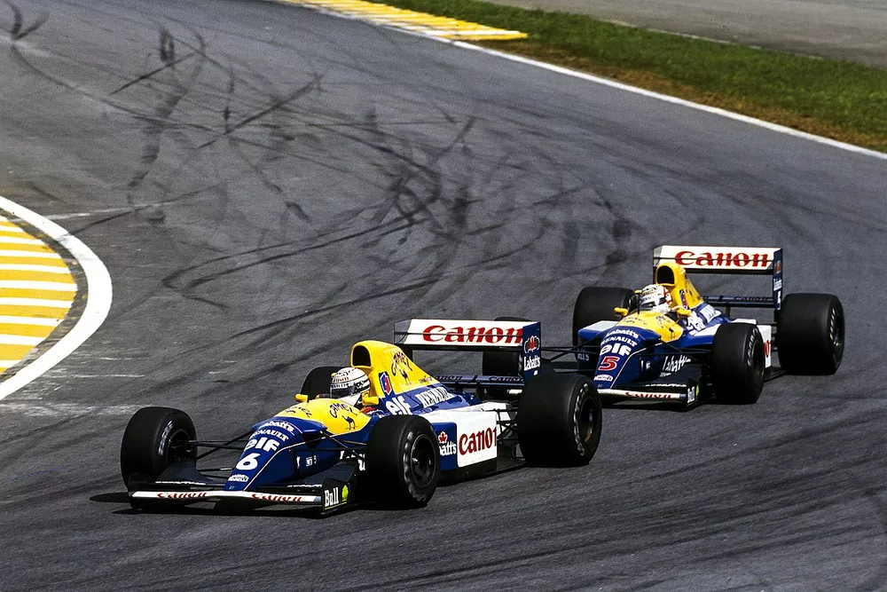 Riccardo Patrese, Williams FW14B Renault, leads Nigel Mansell, Williams FW14B Renault