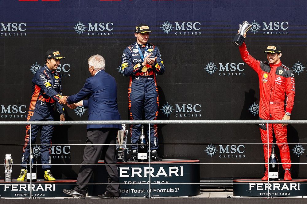 Sergio Perez, Red Bull Racing, 2nd position, Max Verstappen, Red Bull Racing, 1st position, Charles Leclerc, Scuderia Ferrari, 3rd position, on the podium