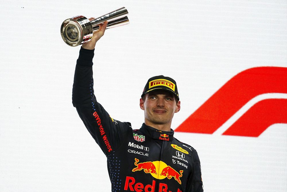 Max Verstappen, Red Bull Racing, 2nd position, lifts his trophy on the podium
