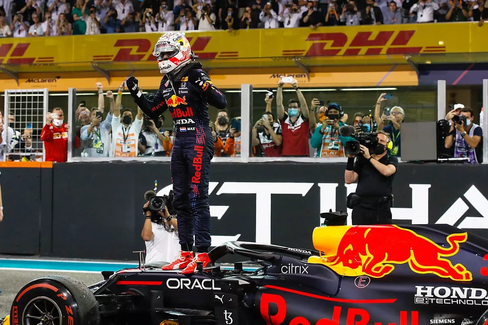 Max Verstappen, Red Bull Racing, 1st position, celebrates on arrival in Parc Ferme after securing the 2021 drivers title
