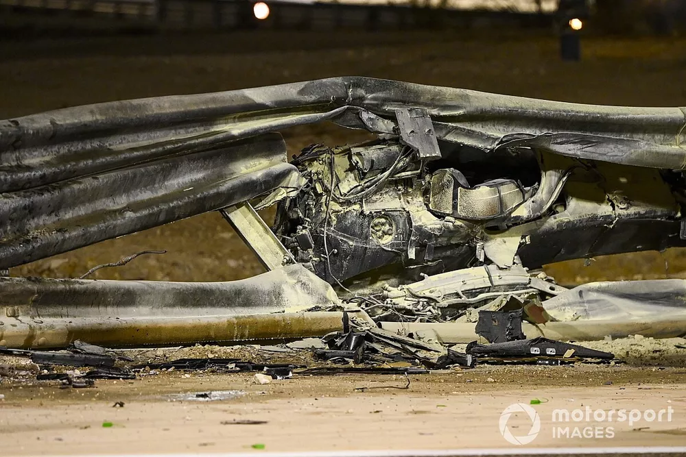 Damage to the barrier after a first lap crash for Romain Grosjean, Haas F1