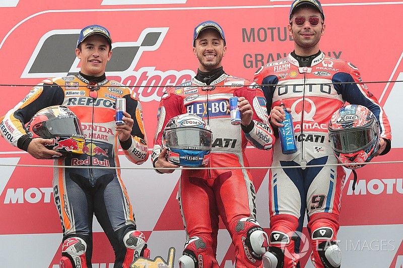 Podio Andrea Dovizioso, Marc Márquez y Danilo Petrucci