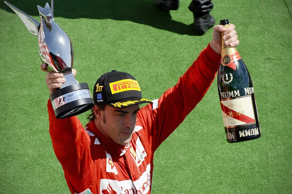 El ganador de la carrera Fernando Alonso, Ferrari