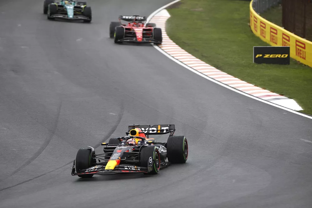 Max Verstappen, Red Bull Racing RB19, leads Charles Leclerc, Ferrari SF-23, and Fernando Alonso, Aston Martin AMR23