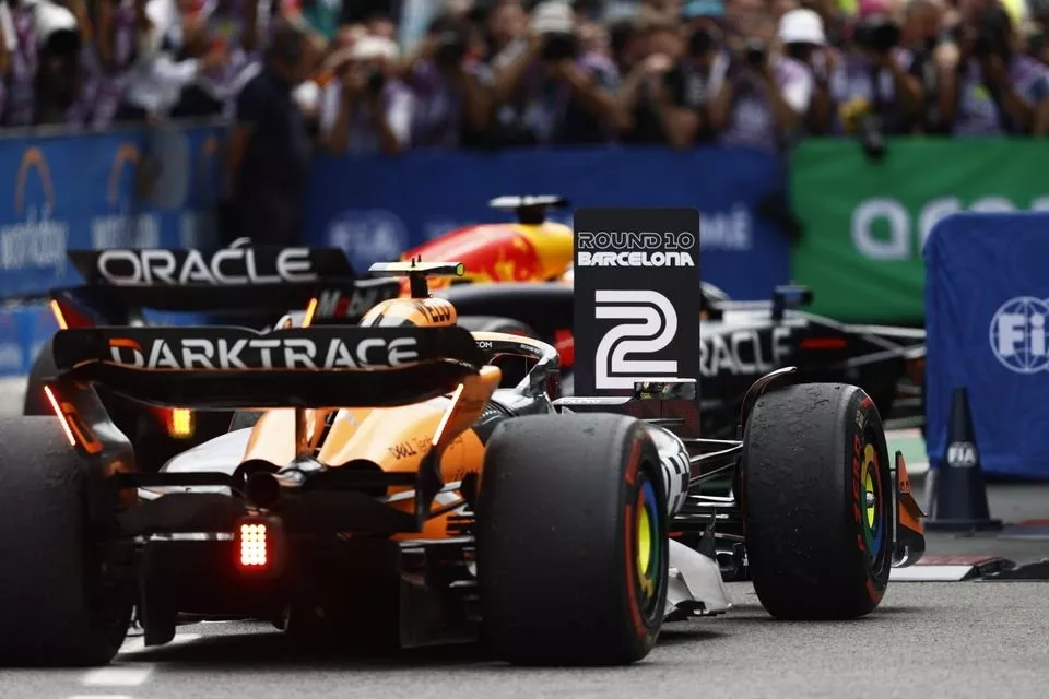 Lando Norris, McLaren MCL38, 2nd position, parks his car in Parc Ferme 