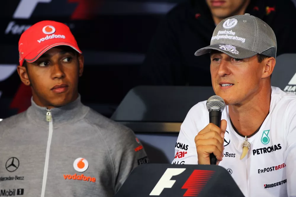Lewis Hamilton, McLaren with Michael Schumacher, Mercedes GP in the FIA Press Conference