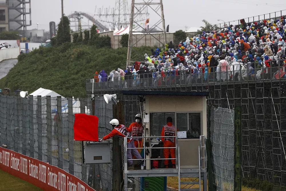 Marshals wave the red flag