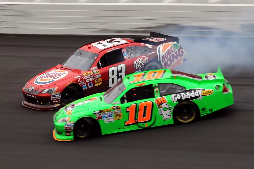 Danica Patrick and Landon Cassill spin