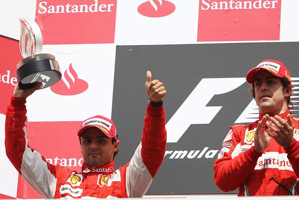 Podium: first place Fernando Alonso, Ferrari, second place Felipe Massa