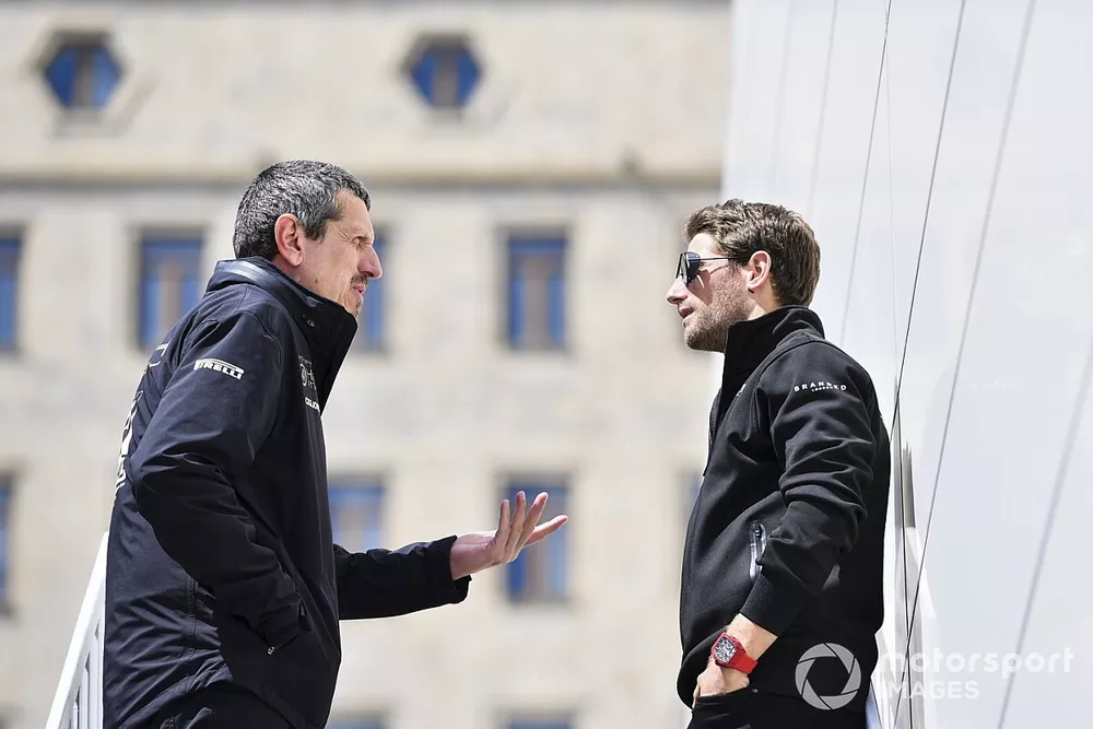 Guenther Steiner, Team Principal, Haas F1, talks with Romain Grosjean, Haas F1