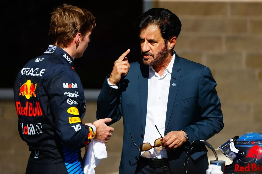 Mohammed Ben Sulayem, President, FIA, talks with Max Verstappen, Red Bull Racing, 3rd position, in Parc Ferme