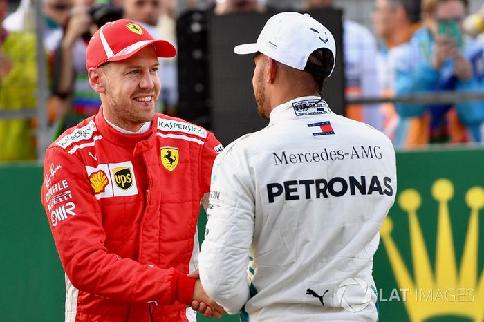 Sebastian Vettel, Ferrari amd Lewis Hamilton, Mercedes-AMG F1 celebrate in parc ferme