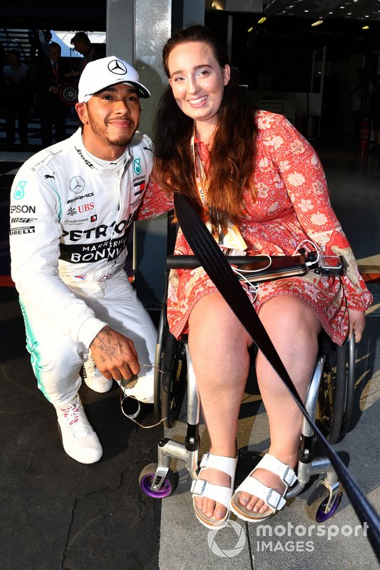 Lewis Hamilton, Mercedes AMG F1, with a guest