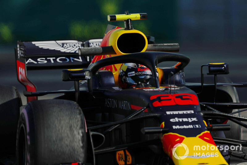 Verstappen leaves a puff of smoke while exiting pit box in practice