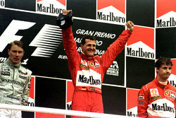 Podium: Race winner Michael Schumacher, Ferrari; second place Mika Hakkinen, McLaren; third place Eddie Irvine, Ferrari