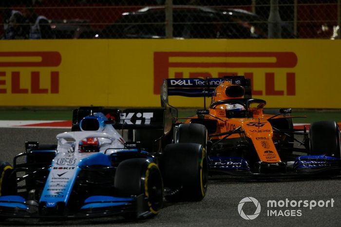 George Russell, Williams Racing FW42, leads Carlos Sainz Jr., McLaren MCL34