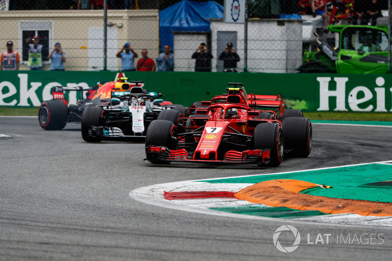 Kimi Raikkonen, Ferrari SF71H, leads Sebastian Vettel, Ferrari SF71H, Lewis Hamilton, Mercedes AMG F1 W09, and Max Verstappen, Red Bull Racing RB14, at the start of the race