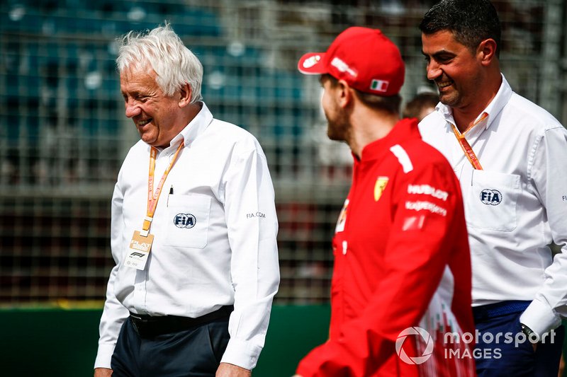 Charlie Whiting, Direttore di gara, FIA, con Sebastian Vettel, Ferrari