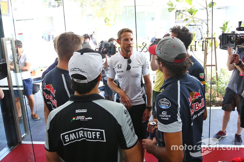 Jenson Button, McLaren celebrates his 300th GP with Daniel Ricciardo, Red Bull Racing; Marcus Ericss