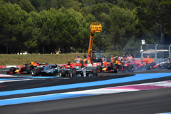 Lewis Hamilton, Mercedes-AMG F1 W09 leads at the start of the race as Sebastian Vettel, Ferrari SF71H hits Valtteri Bottas, Mercedes-AMG F1 W09