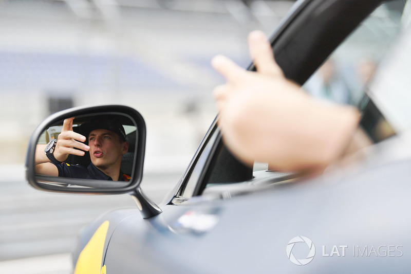 Max Verstappen, Red Bull Racing in an Aston Martin