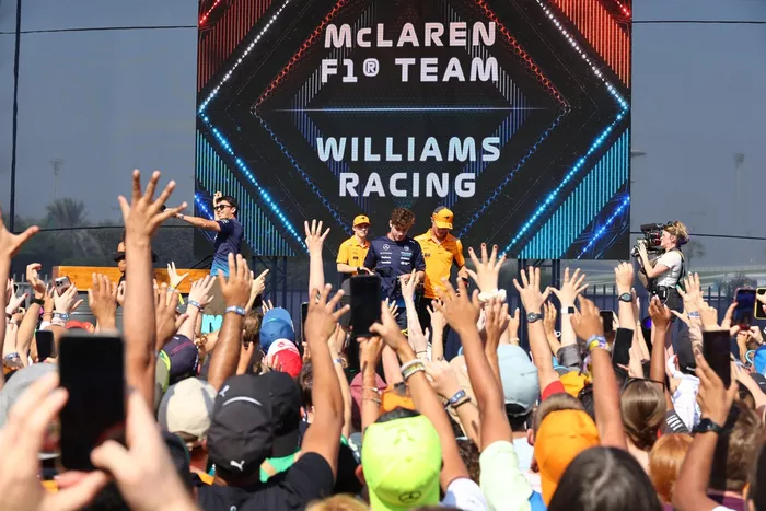 Alex Albon, Williams Racing, Oscar Piastri, McLaren F1 Team, Lando Norris, McLaren F1 Team, Franco Colapinto, Williams Racing, on stage in the Fanzone