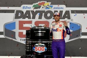 Denny Hamlin, Joe Gibbs Racing, Toyota Camry FedEx Express, celebrates in victory Lane after winning the Daytona 500.